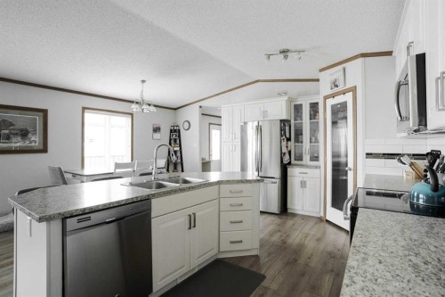 104 Beacon Hill Place, Fort Mcmurray, AB - Indoor Photo Showing Kitchen With Double Sink