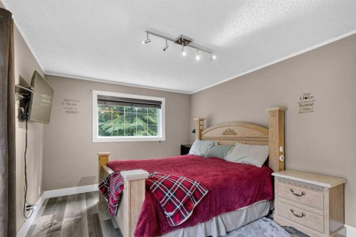 102 Gregoire Drive, Anzac, AB - Indoor Photo Showing Bedroom