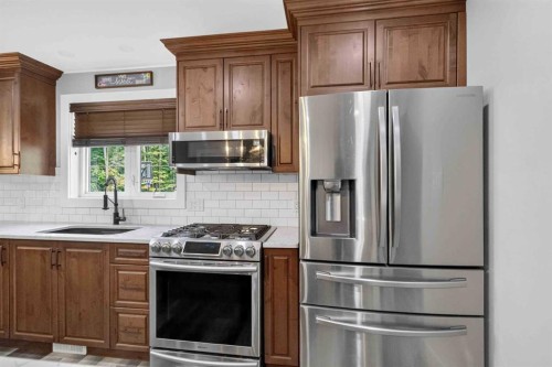 102 Gregoire Drive, Anzac, AB - Indoor Photo Showing Kitchen With Stainless Steel Kitchen