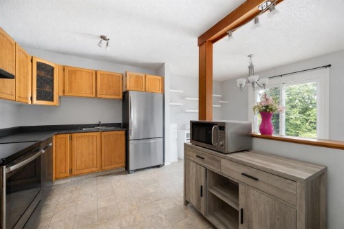 122 Bird Crescent, Fort Mcmurray, AB - Indoor Photo Showing Kitchen With Double Sink