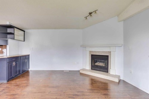 180 Cokerill Crescent, Fort Mcmurray, AB - Indoor Photo Showing Living Room With Fireplace