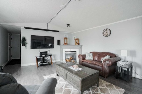 161 Harpe Way, Fort Mcmurray, AB - Indoor Photo Showing Living Room With Fireplace