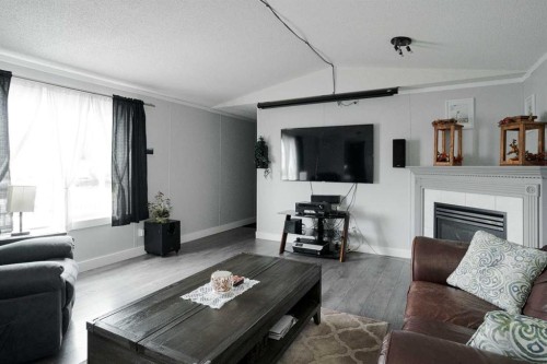 161 Harpe Way, Fort Mcmurray, AB - Indoor Photo Showing Living Room With Fireplace