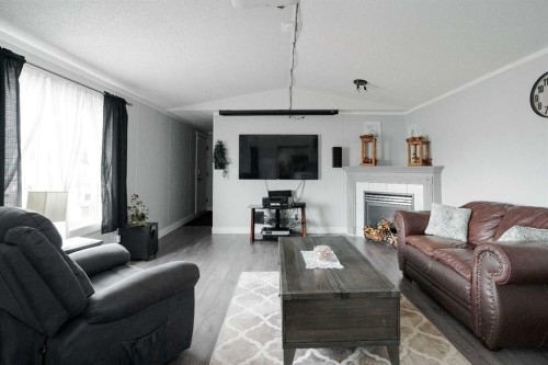 161 Harpe Way, Fort Mcmurray, AB - Indoor Photo Showing Living Room With Fireplace