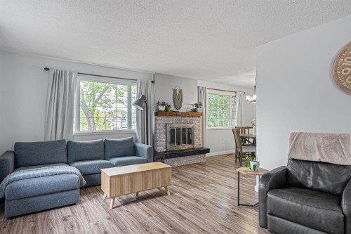 120 Dowd Road, Fort Mcmurray, AB - Indoor Photo Showing Living Room With Fireplace