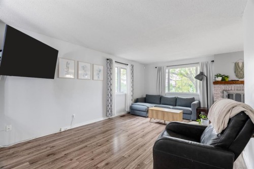 120 Dowd Road, Fort Mcmurray, AB - Indoor Photo Showing Living Room With Fireplace