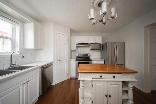 53-100 St.Laurent Way, Fort Mcmurray, AB - Indoor Photo Showing Kitchen With Stainless Steel Kitchen