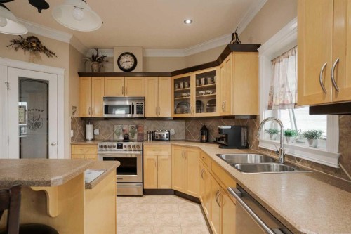 128 Dogwood Lane, Fort Mcmurray, AB - Indoor Photo Showing Kitchen With Double Sink