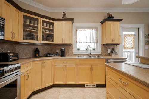 128 Dogwood Lane, Fort Mcmurray, AB - Indoor Photo Showing Kitchen With Double Sink