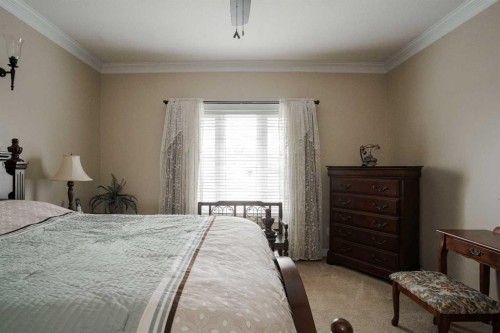 128 Dogwood Lane, Fort Mcmurray, AB - Indoor Photo Showing Bedroom