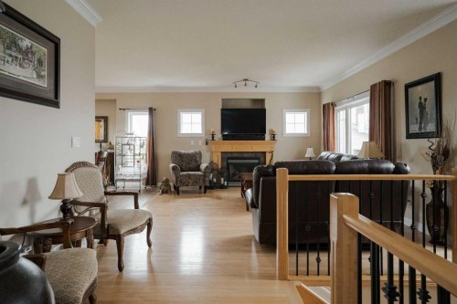 128 Dogwood Lane, Fort Mcmurray, AB - Indoor Photo Showing Living Room With Fireplace