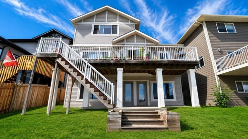 147 Killdeer, Fort Mcmurray, AB - Outdoor With Deck Patio Veranda With Facade