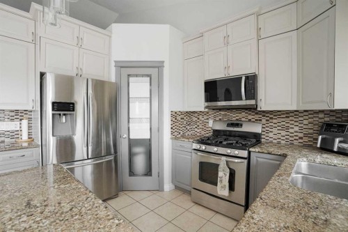 147 Killdeer, Fort Mcmurray, AB - Indoor Photo Showing Kitchen With Double Sink With Upgraded Kitchen