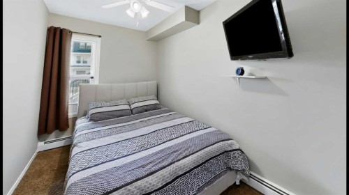 524-201 Abasand Drive, Fort Mcmurray, AB - Indoor Photo Showing Bedroom