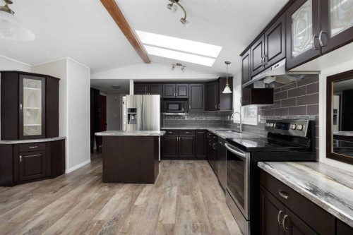 132 Grey Owl Place, Fort Mcmurray, AB - Indoor Photo Showing Kitchen With Stainless Steel Kitchen With Double Sink With Upgraded Kitchen