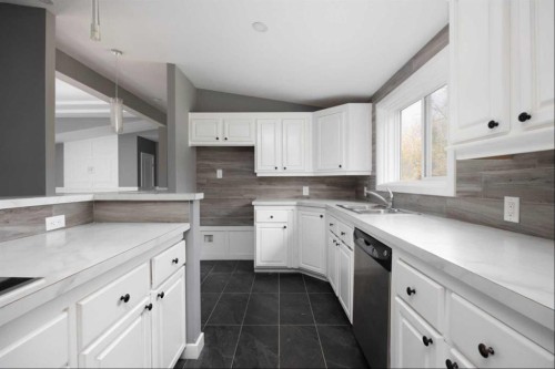 324 Evergreen Road, Rural Athabasca County, AB - Indoor Photo Showing Kitchen With Double Sink