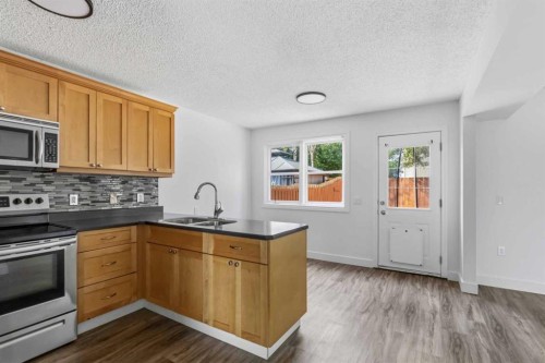 188 Windsor Drive, Fort Mcmurray, AB - Indoor Photo Showing Kitchen With Double Sink