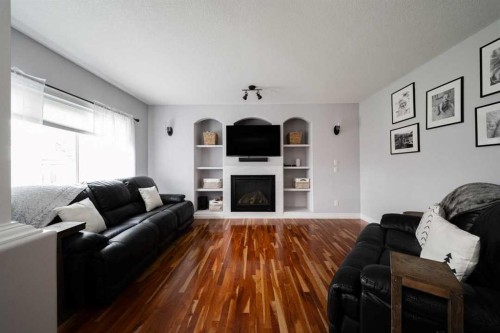 521 Walnut Crescent, Fort Mcmurray, AB - Indoor Photo Showing Living Room With Fireplace