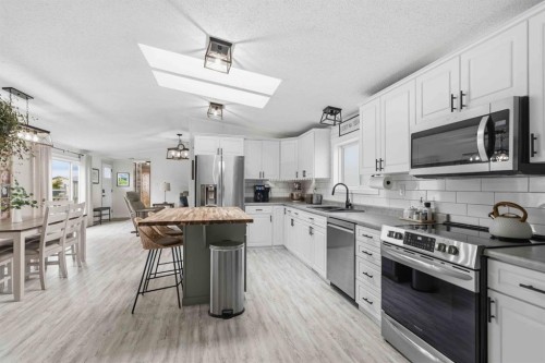 105 Sumac Crescent, Fort Mcmurray, AB - Indoor Photo Showing Kitchen With Upgraded Kitchen