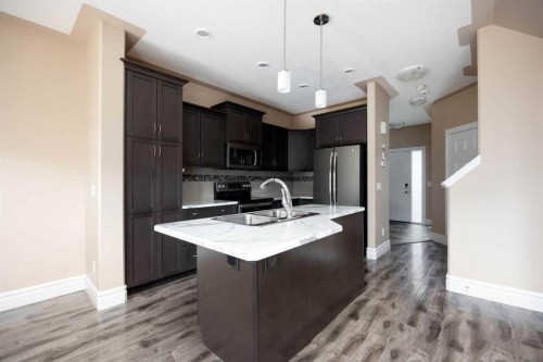 154 Athabasca Crescent, Fort Mcmurray, AB - Indoor Photo Showing Kitchen With Double Sink With Upgraded Kitchen