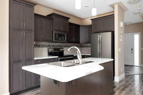 154 Athabasca Crescent, Fort Mcmurray, AB - Indoor Photo Showing Kitchen With Stainless Steel Kitchen With Double Sink With Upgraded Kitchen