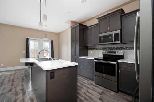 154 Athabasca Crescent, Fort Mcmurray, AB - Indoor Photo Showing Kitchen With Double Sink