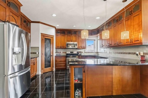 115 Widgeon Place, Fort Mcmurray, AB - Indoor Photo Showing Kitchen With Stainless Steel Kitchen
