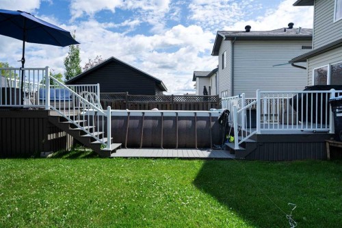 213 Parry Crescent, Fort Mcmurray, AB - Outdoor With Above Ground Pool With Deck Patio Veranda With Exterior