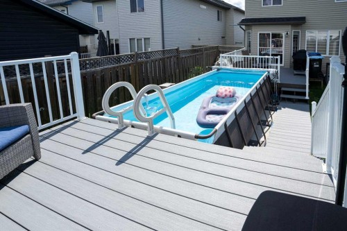 213 Parry Crescent, Fort Mcmurray, AB - Outdoor With Above Ground Pool With Deck Patio Veranda With Exterior