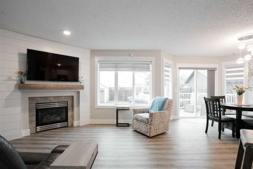 213 Parry Crescent, Fort Mcmurray, AB - Indoor Photo Showing Living Room With Fireplace
