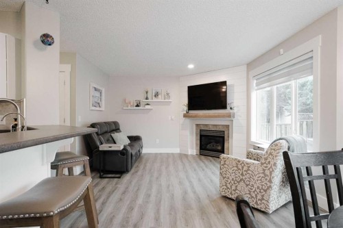 213 Parry Crescent, Fort Mcmurray, AB - Indoor Photo Showing Living Room With Fireplace
