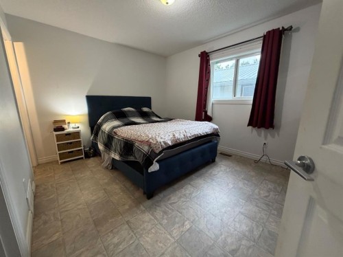 708 6 Street, Smith, AB - Indoor Photo Showing Bedroom