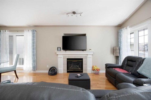 168 Lightbown Way, Fort Mcmurray, AB - Indoor Photo Showing Living Room With Fireplace