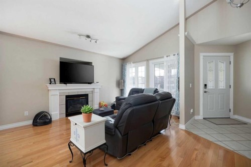 168 Lightbown Way, Fort Mcmurray, AB - Indoor Photo Showing Living Room With Fireplace