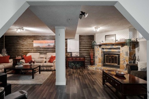 114 Hilltop Crescent, Fort Mcmurray, AB - Indoor Photo Showing Other Room With Fireplace