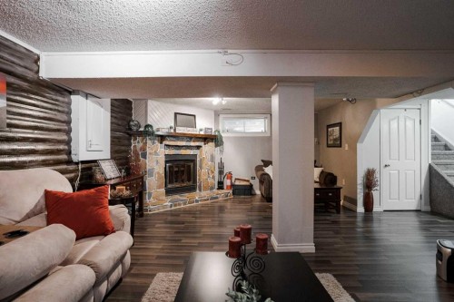 114 Hilltop Crescent, Fort Mcmurray, AB - Indoor Photo Showing Living Room With Fireplace