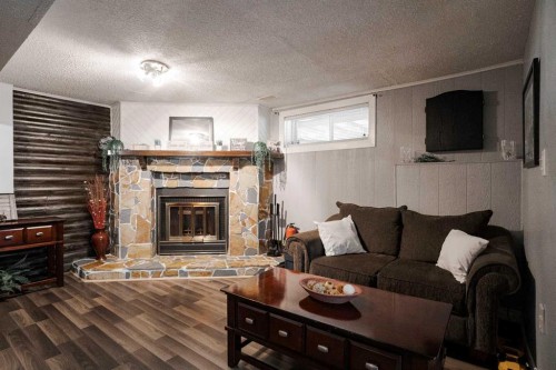 114 Hilltop Crescent, Fort Mcmurray, AB - Indoor Photo Showing Living Room With Fireplace