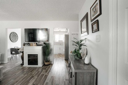 114 Hilltop Crescent, Fort Mcmurray, AB - Indoor Photo Showing Other Room With Fireplace