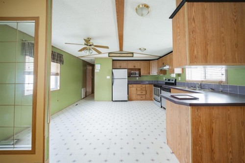 152 Cree Road, Fort Mcmurray, AB - Indoor Photo Showing Kitchen With Double Sink