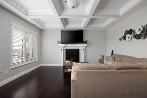 724 Heritage Drive, Fort Mcmurray, AB - Indoor Photo Showing Living Room With Fireplace