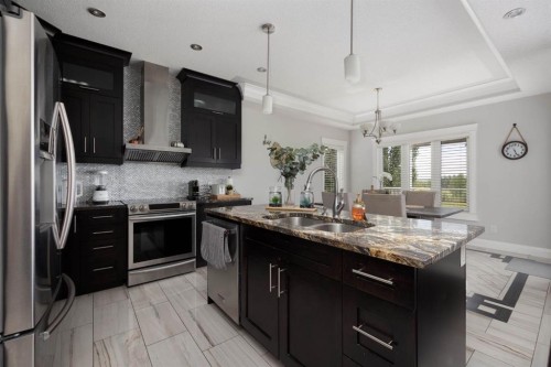724 Heritage Drive, Fort Mcmurray, AB - Indoor Photo Showing Kitchen With Double Sink With Upgraded Kitchen