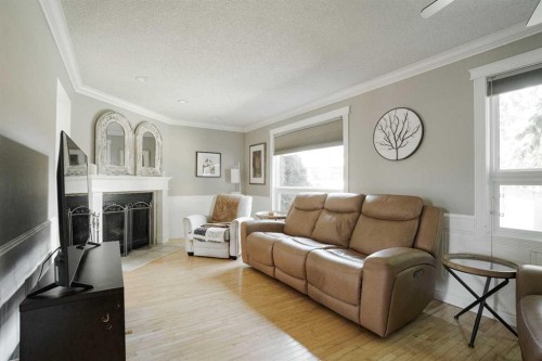 108 Norbasca Bay, Fort Mcmurray, AB - Indoor Photo Showing Living Room With Fireplace