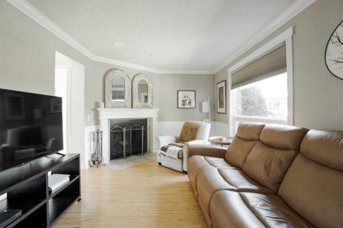 108 Norbasca Bay, Fort Mcmurray, AB - Indoor Photo Showing Living Room With Fireplace