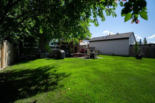 108 Norbasca Bay, Fort Mcmurray, AB - Outdoor With Backyard
