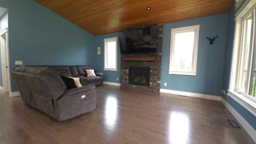 183069 Hwy 663, Boyle, AB - Indoor Photo Showing Living Room With Fireplace