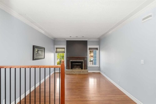 125 Oaks Crescent, Fort Mcmurray, AB - Indoor Photo Showing Other Room With Fireplace