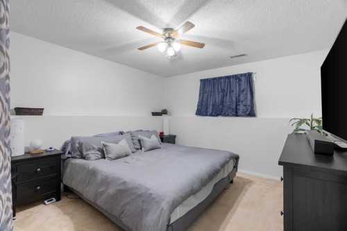 128 Cornwall Drive, Fort Mcmurray, AB - Indoor Photo Showing Bedroom