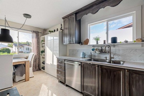 128 Cornwall Drive, Fort Mcmurray, AB - Indoor Photo Showing Kitchen With Double Sink