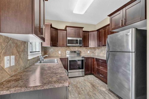 164 Fireweed Crescent, Fort Mcmurray, AB - Indoor Photo Showing Kitchen With Double Sink With Upgraded Kitchen