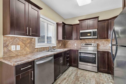 164 Fireweed Crescent, Fort Mcmurray, AB - Indoor Photo Showing Kitchen With Double Sink